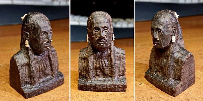 Приклеивание мелких деталей к деревянной фигуре человека из древесины гренадила